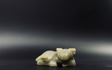 A fine old Hetian pale green jade of a...