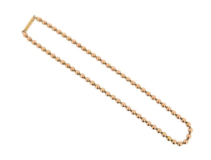 A gold bead necklace, the spherical links set on flexible neck chain, 42cm long, 30g