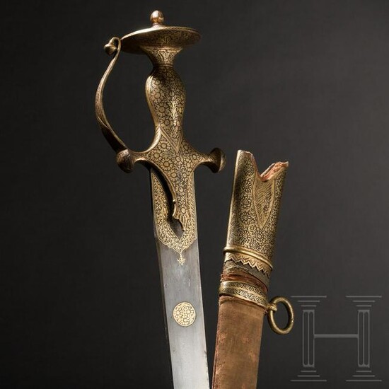 A gold-inlaid Indian tulwar with single-edged blade of
