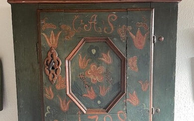 SOLD. A greenpainted wall cupboard, door and drawer in front. Dated 1798. H. 64. W. 51. D. 26 cm. – Bruun Rasmussen Auctioneers of Fine Art