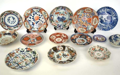 A group of fourteen Japanese imari and other side plates...
