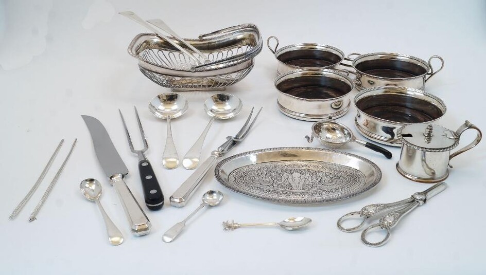 A group of silver plate, to include: a cake basket of pierced form with swing handle, 24cm wide; a double wine coaster, with turned wood interiors and baize lined bases, having engraved horse head crests to sides, 33cm wide; two similar individual...