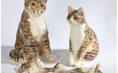 A group of three 'Winstanley' pottery Tabby Cats, signed to ...
