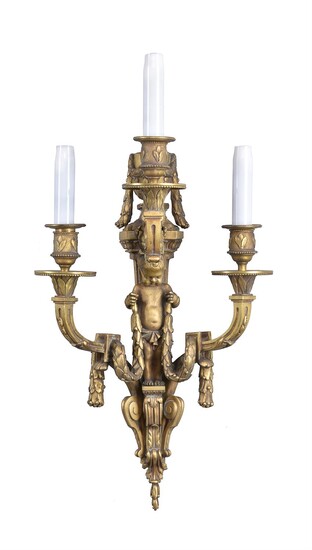 A late 19th century French gilt bronze wall light and another