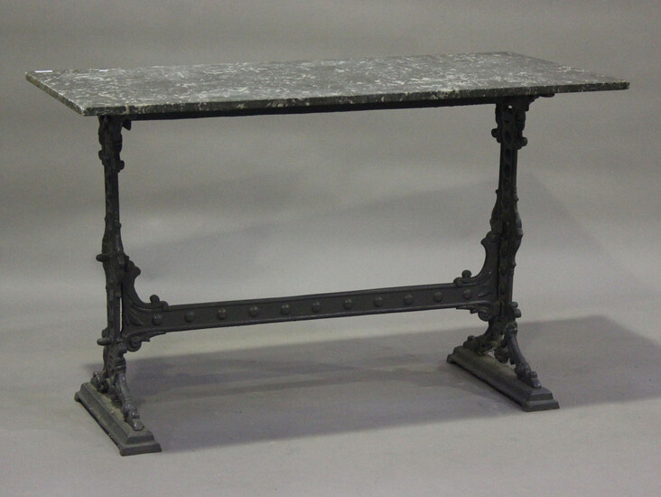 A late 19th century grey painted cast iron garden table with a veined grey marble top, height 77cm