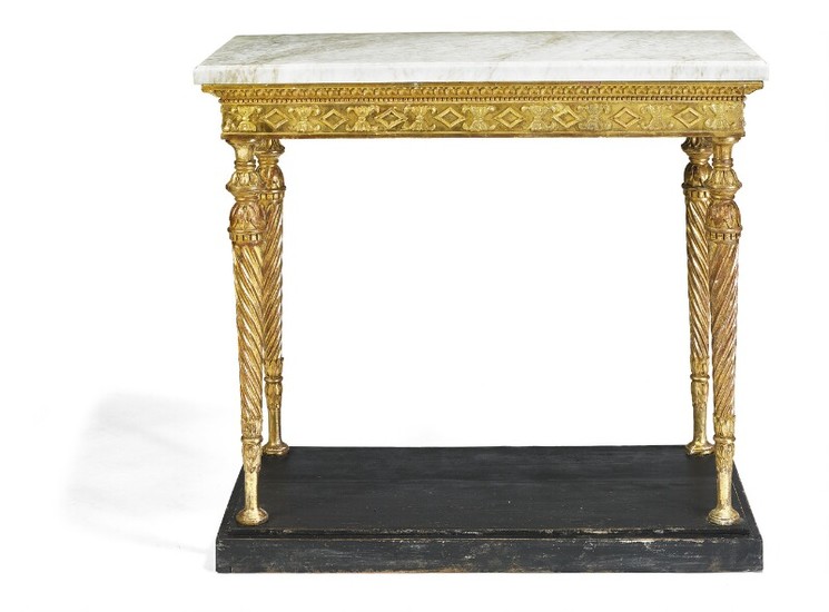 A late Gustavian giltwood console with white marble top. Sweden, late 18th century. H. 88 cm. W. 97 cm. D. 47 cm.