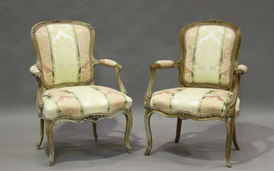 A near pair of 18th century Louis XV walnut framed fauteuil armchairs with carved decoration, on cab