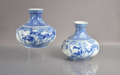 A pair of 19th Century Japanese blue and white Seto or Arita squat-shaped vases