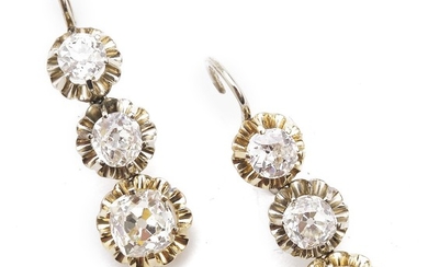 A pair of Belle Èpoque diamond ear pendants each set with old-cut diamonds weighing a total of app. 4.26 ct., mounted in platinum and gold. Circa 1890. (2)
