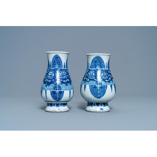 A pair of Chinese blue and white 'taotie' vases, KangxiDescr...