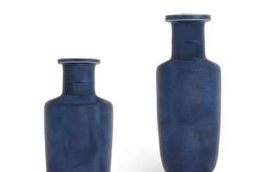 A pair of Chinese powder blue rouleau vases