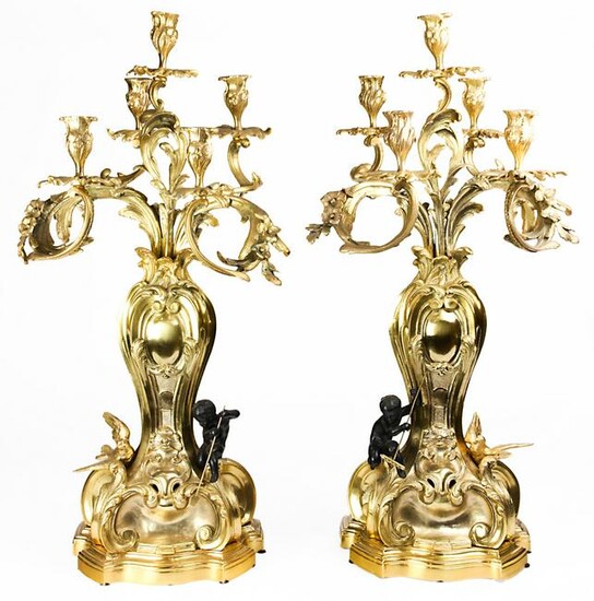 A pair of Empire style gilt mounted five light