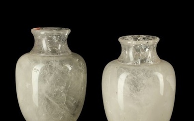 A pair of Neoclassical style rock crystal urns