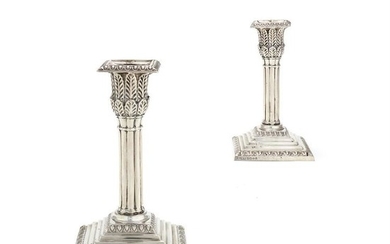 A pair of Victorian silver cluster column candlesticks by Hawksworth, Eyre & Co. Ltd