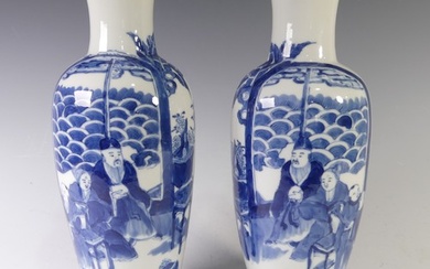 A pair of antique Chinese blue and white Vases, of slim balu...
