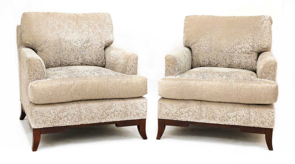 A pair of contemporary Baker lounge chairs