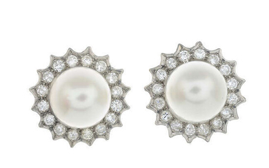 A pair of cultured pearl and brilliant-cut diamond cluster earrings.