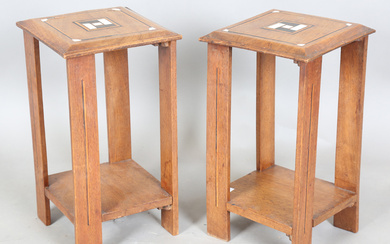 A pair of early 20th century Arts and Crafts walnut two-tier occasional tables, both stamped 'Libert