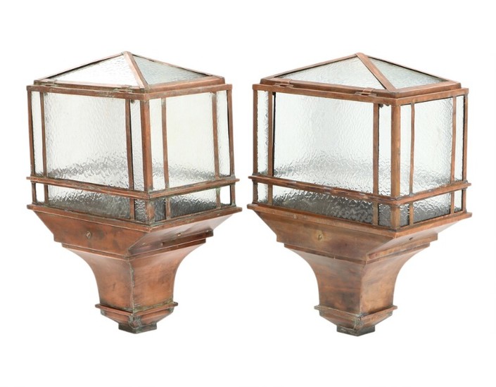 A pair of early 20th century English patinated copper steet lamps with frosted glass sides. H. 80. W. 51. D. 32 cm. (2)