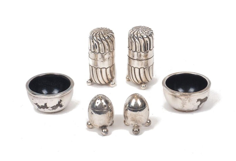 A pair of fluted cylindrical cruets, Birmingham, c.1889, Stokes & Ireland, together with a pair of egg-shaped cruets, stamped sterling, and a pair of silver salts, Birmingham, c.1930, Joseph Gloster, weighable weight approx. 3oz (6)