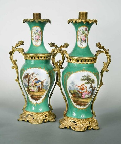 A pair of porcelain and gilt metal mounted two-handled