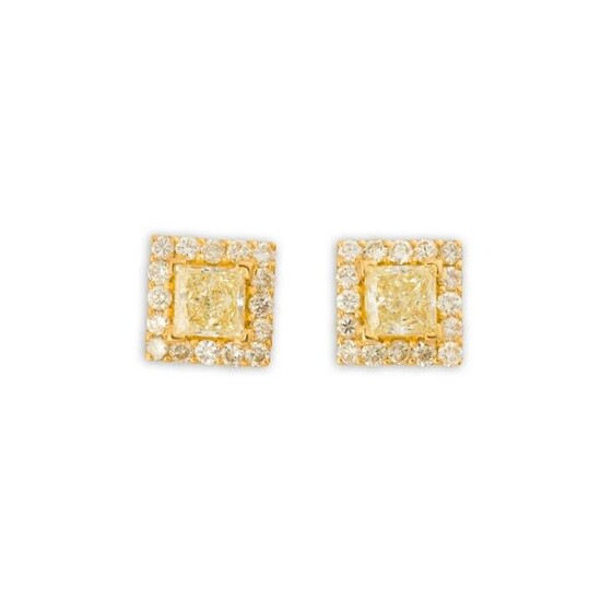 A pair of yellow and near colorless diamond and
