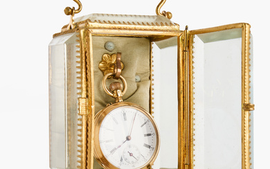 A pocket watch, 19th century, 18k gold, chronometer, 15 rubies, spiral bregues, with associated pocket watch stand.