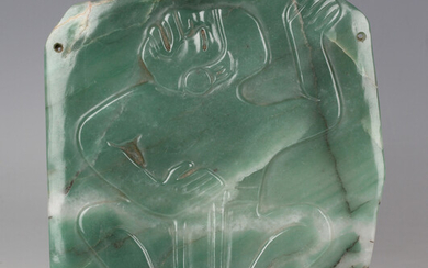 A pre-Columbian Olmec style carved apple green jade pectoral plaque, probably 600-400 BC, carved in