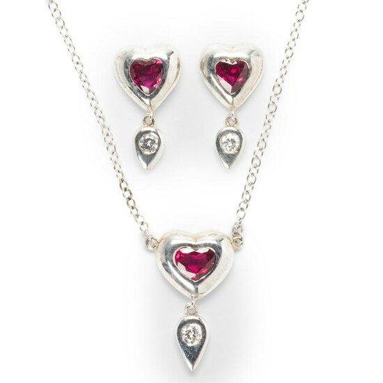 A ruby, diamond and fourteen karat white gold suite