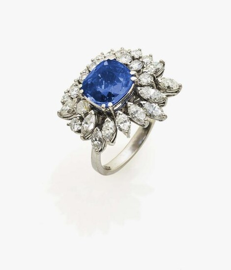 A sapphire and brilliant cut diamond ring