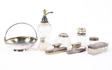 A selection of silver and white metal wares including: a silver mounted match striker and atomizer