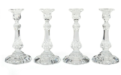 A set of four Baccarat crystal candlesticks