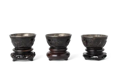 A set of three Chinese coconut wine cups Qing dynasty, 19th century...