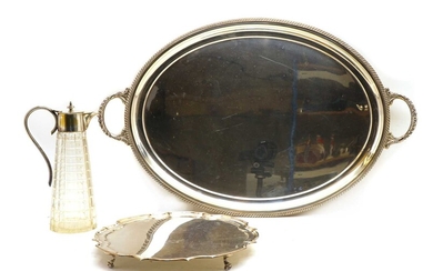 A silver plated twin handled oval serving tray