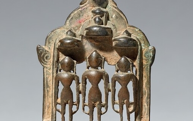 A small copper alloy Jain altar of three tirthankara. Western India, Gujarat. Dated by inscription 1478