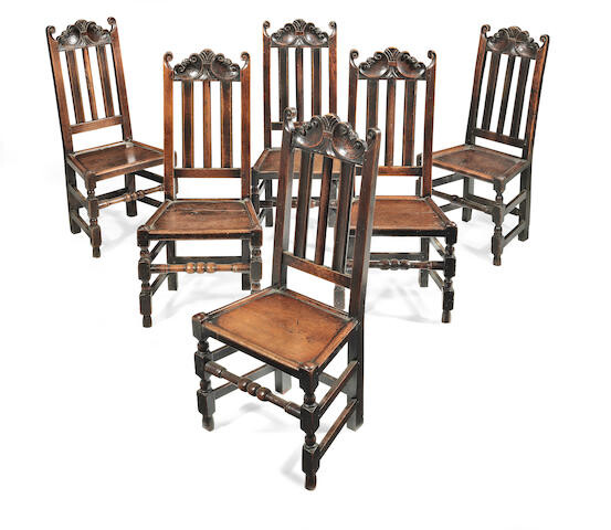 A very near-set of six late 17th century joined oak high-back chairs, English, circa 1685