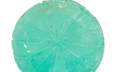 AN ANTIQUE MUGHAL CARVED EMERALD of circular form