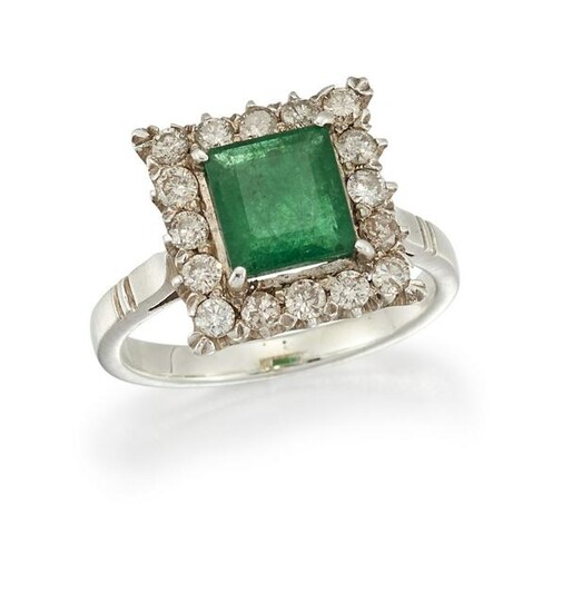 AN EMERALD AND DIAMOND CLUSTER RING The square-cut