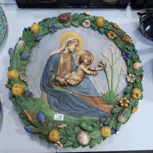 After Della Robbia, a large circular plaster work plaque, Ma...