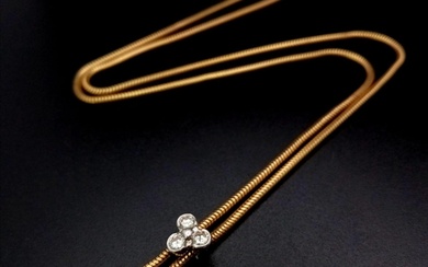 An 18 K yellow gold snake chain necklace with brilliant cut ...