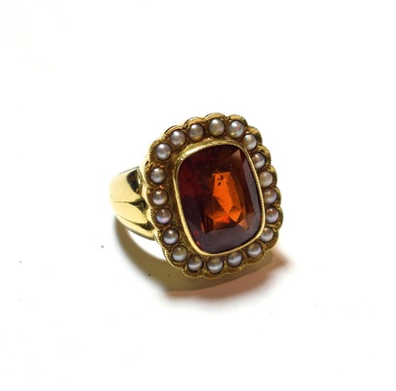 An 18 carat gold hessonite garnet and seed pearl cluster...