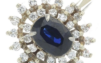 An 18ct gold sapphire and diamond cluster