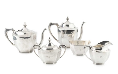 An American silver tea and coffee service, of faceted oval...