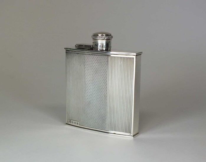 An Art Deco silver hip flask