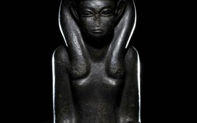 An Egyptian Basalt Portrait Bust of a Woman Height 10