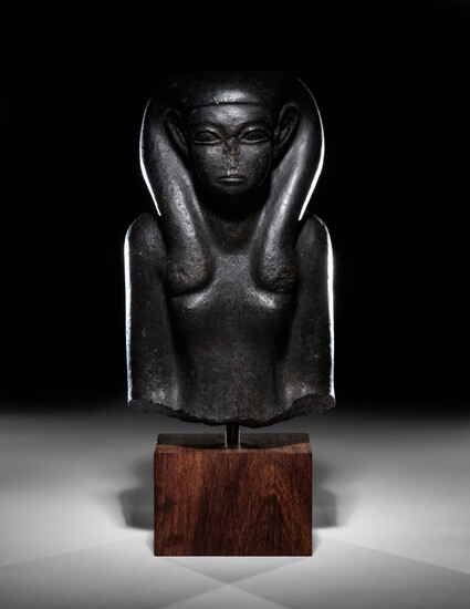 An Egyptian Basalt Portrait Bust of a Woman