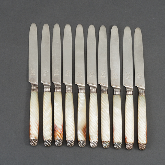 An English set of ten early 19th century silver and mother of pearl chees /fruit knifes.