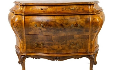 An Italian Rococo Style Olivewood Bombe Commode Height