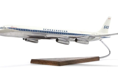 SOLD. An aluminium model plane DC-8 marked SAS LN-MOU, wooden base marked "IBM and SAS, The pioneer still has new worlds to conquer". L. 56 cm. – Bruun Rasmussen Auctioneers of Fine Art