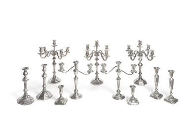 An assembled group of American and Italian weighted sterling silver candlesticks and candelabras